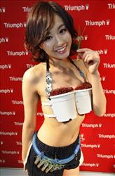 Model displays a Triumph bra during an unveiling in Tokyo  Called Grow-Your-Own-Rice Bra, the new underwear  transforms into a pot that can grow rice.